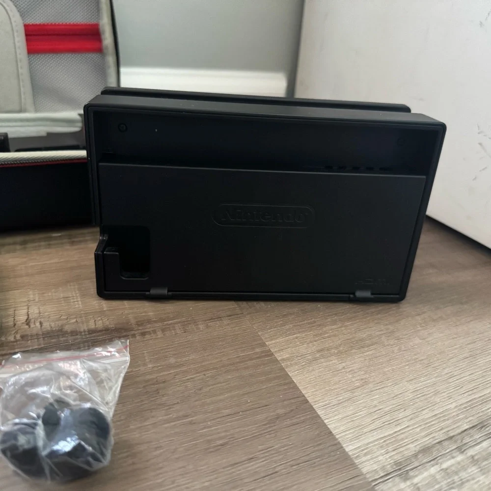 Nintendo Switch with Black and Gray Accessories